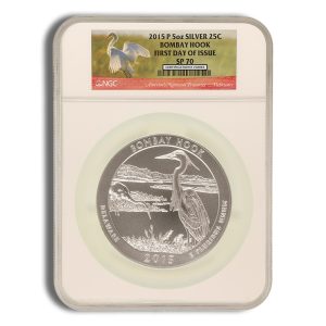A 2015 P five-ounce silver Bombay Hook coin in a protective slab with a label reading First Day of Issue SP70 at the top.