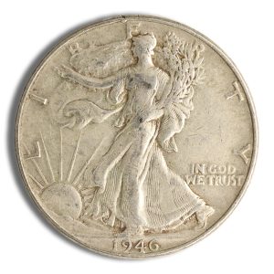 1946 U.S. Walking Liberty half dollar: Lady Liberty walking left with sun rays and 'IN GOD WE TRUST'.