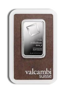 One-ounce palladium bullion bar from Valcambi Suisse, engraved '1 oz palladium 999,5' on a silver ingot mounted on a brown background with the Valcambi logo nearby.