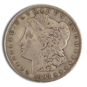 Morgan silver dollar, obverse: Liberty profile facing left, E PLURIBUS UNUM around rim, 1897 at bottom, star border edge.