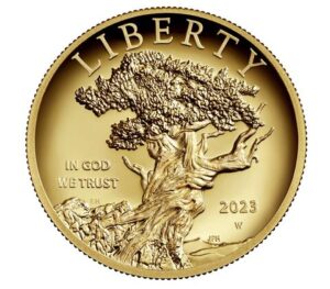 Gold coin with a twisted tree design, LIBERTY and IN GOD WE TRUST inscribed, year 2023